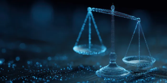 Scales of justice symbol in a dark blue digital futuristic environment.